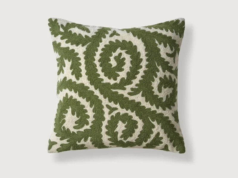 Green and cream embroidered swirl cushion