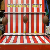 A traditional coconut shy stall